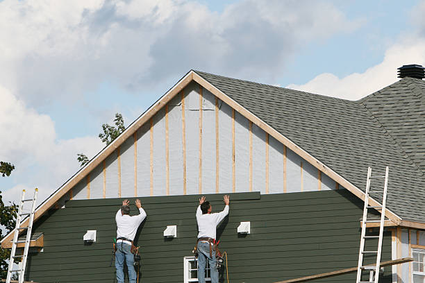 Professional Siding Repair technician working in Piney Point, MD